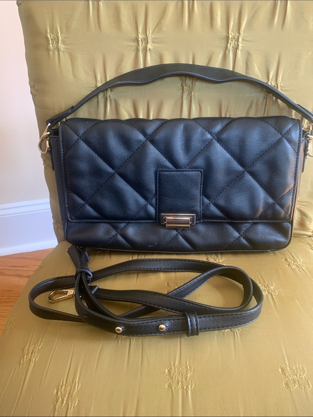 Black quilted handbag